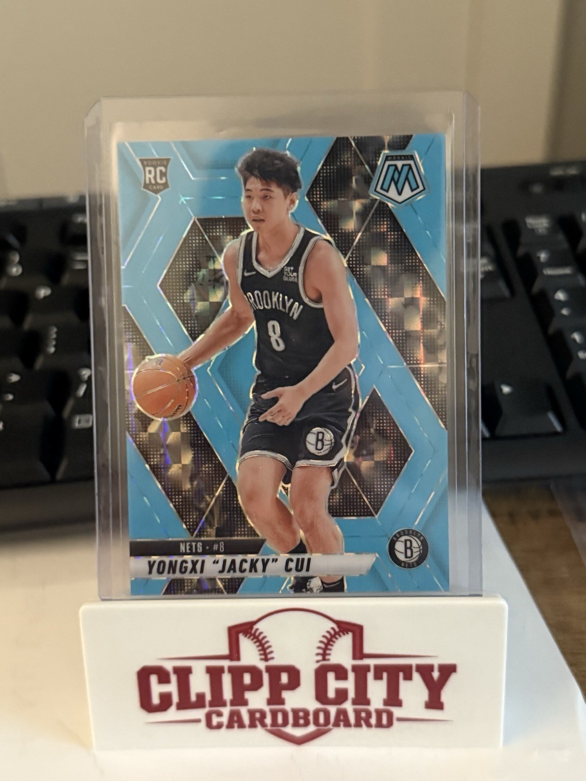 2024-25 Panini Mosaic Fluorescent Blue /75 - Rookies Yongxi "Jacky" Cui #212 RC