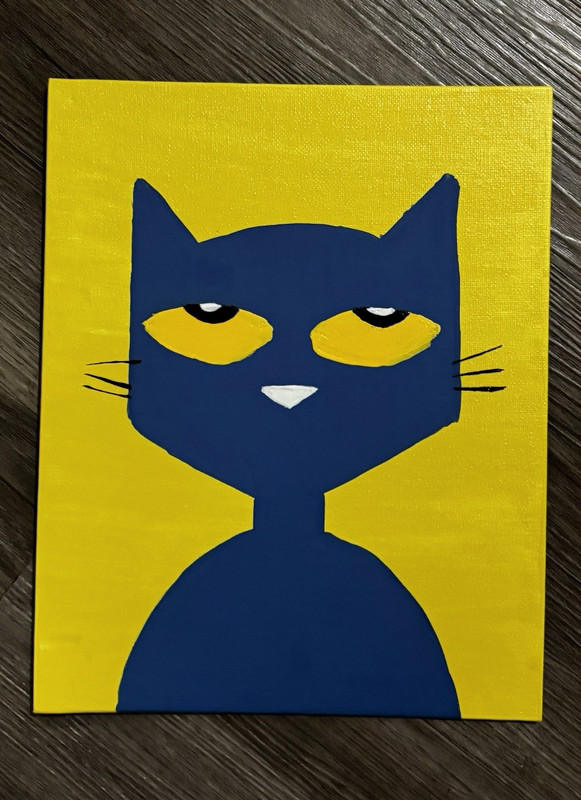 pete the cat painting on a canvas.