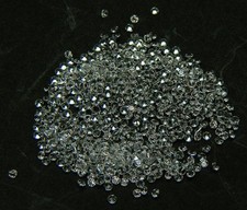 100 PCS. ROUND 1.3 MM. MACHINE CUT WHITE SAPPHIRE LAB CORUNDUM