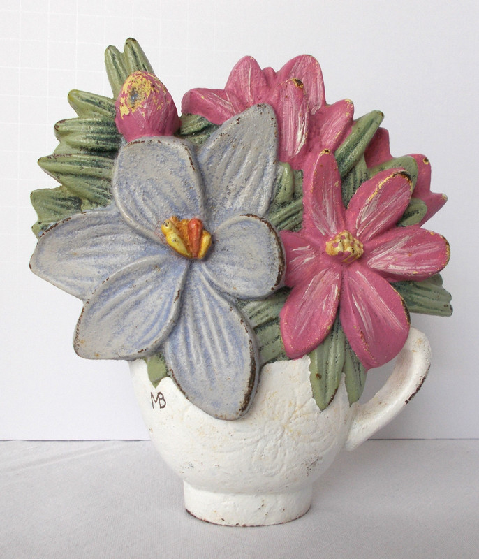 VINTAGE CAST IRON DOOR STOP DUTCH ARTIST MARJOLEIN BASTIN FLORAL BOUQUET DESIGN