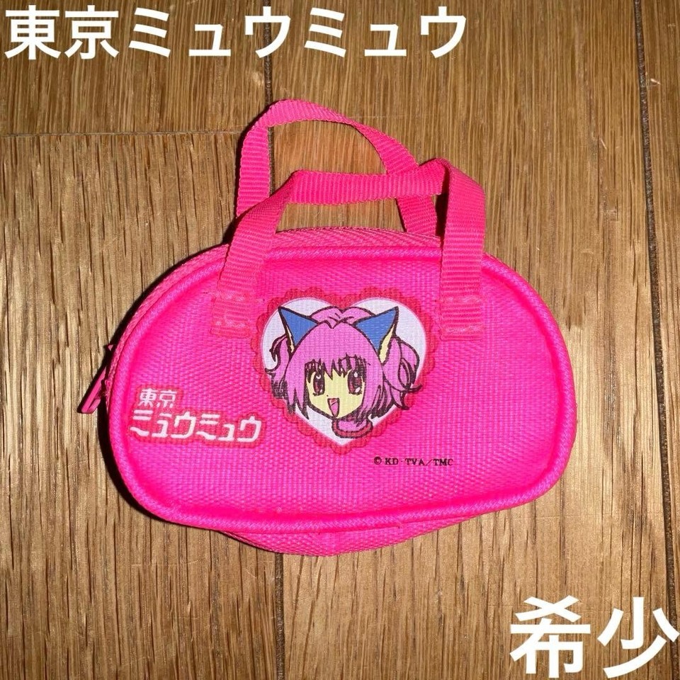 A near-mint Tokyo Mew Mew mini pouch from the early 2000s — a legitimately scarce piece of magical-girl anime history that dedicated fans would treasure.