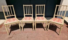 Série de 4 chaises de style Louis XVI en bois laqué gris dossier ajouré colonnes