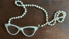 Coti Vision pearl necklace with detachable reading glasses.