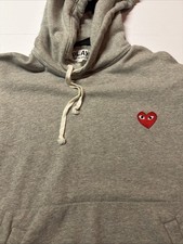 Play Comme des Garcons Hooded Sweatshirt Size...