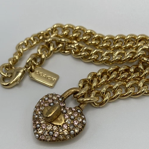 Bracciale Coach Lucchetto Cuore Tono Oro Pavè Cristalli Rosa e Perle 7 5” 1” Ext