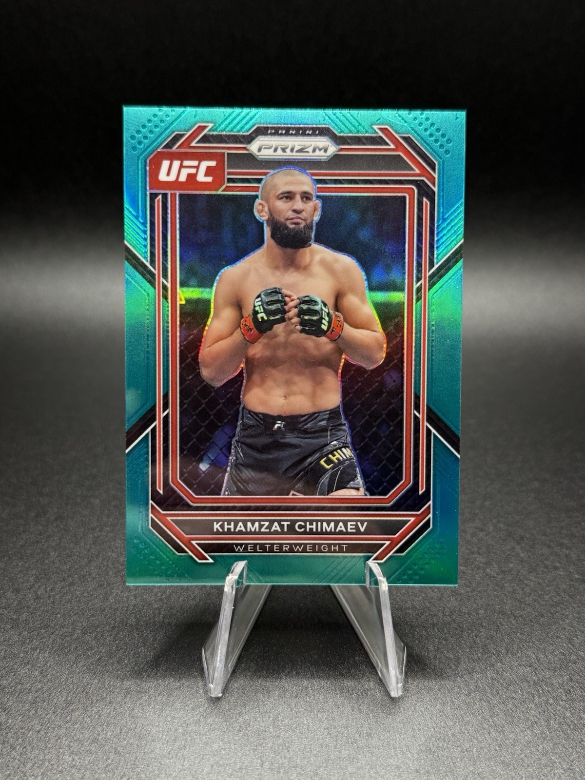 2023 Panini Prizm UFC - Teal Prizm #150 KHAMZAT CHIMAEV /49 UNDEFEATED CHAMPION