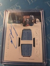 2017 National Treasures Corey Davis Dual Rookie Jersey On Card Auto RC #96/99. rookie card picture