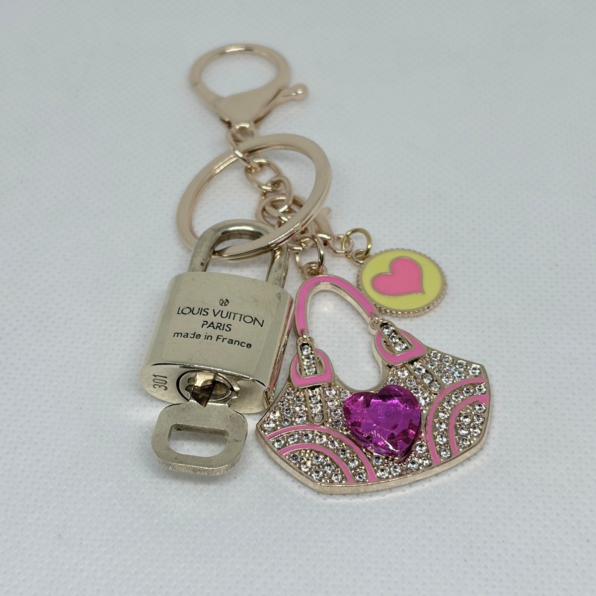 Louis Vuitton Lock and Key #301 w/a Gold Crystal Handbag Heart