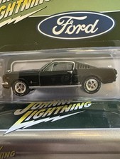 1:64 JOHNNY LIGHTNING 1965 FORD MUSTANG 2+2 FASTBACK IVY GREEN POLY STORGE TIN.