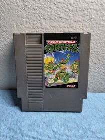 Teenage Mutant Ninja Turtles (NES, 1989) cartuccia, manuale e custodia. Testato