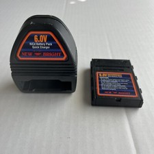 New Bright R/C NiCd 6 V Volt Battery and Wall Charger 670 Untested