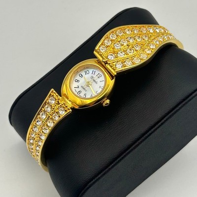 Xanadu Gold Tone Mother Pearl Rhinestones Accents Women s Watch  New Battery