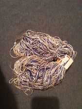 Has Sequins. Lucci Fancy Tape Yarn. Color Is Blue Iris & Clear Peach