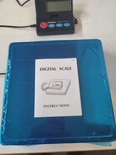 shipping scale 110 lb DC/AC power removable 9" x 9" stainless cover. lb,kg,gram