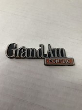 1973 1974 1975 1976 Pontiac Grand Am 9657700 Oem Name Plate Emblem Badge 0503 1973 1974 1975 1976 Pontiac Grand Am 9657700 Oem Name Plate Emblem Badge 0503