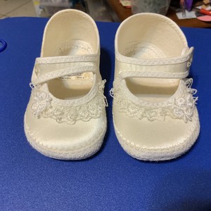 white satin baby shoes