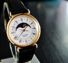 VINTAGE PULSAR SEIKO ELEGANT MOON PHASE QUARTZ WOMEN'S GOLDEN BLACK DRESS WATCH