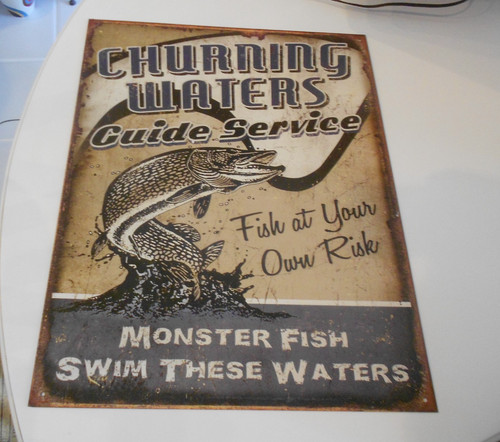 CHURNING WATERS GUIDE SERVICE FISH AT YOUR OWN RISK TIN SIGN 12" X 16"