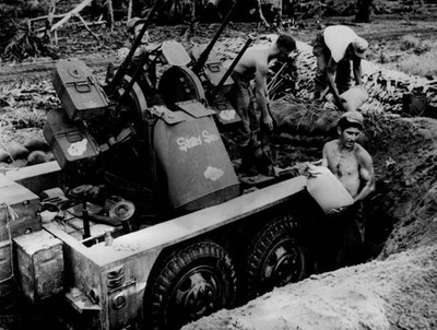 American troops dig in set up their anti aircraft guns to keep Jap- Old Photo