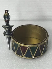 BOMBAY CO. ENAMEL METAL WINE BOTTLE STOPPER AND BOTTLE HOLDER NUTCRACKER DRUM