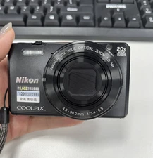 Nikon COOLPIX S7000 16.0MP 20X Optical Zoom Vintage Digital Camera w/Battery