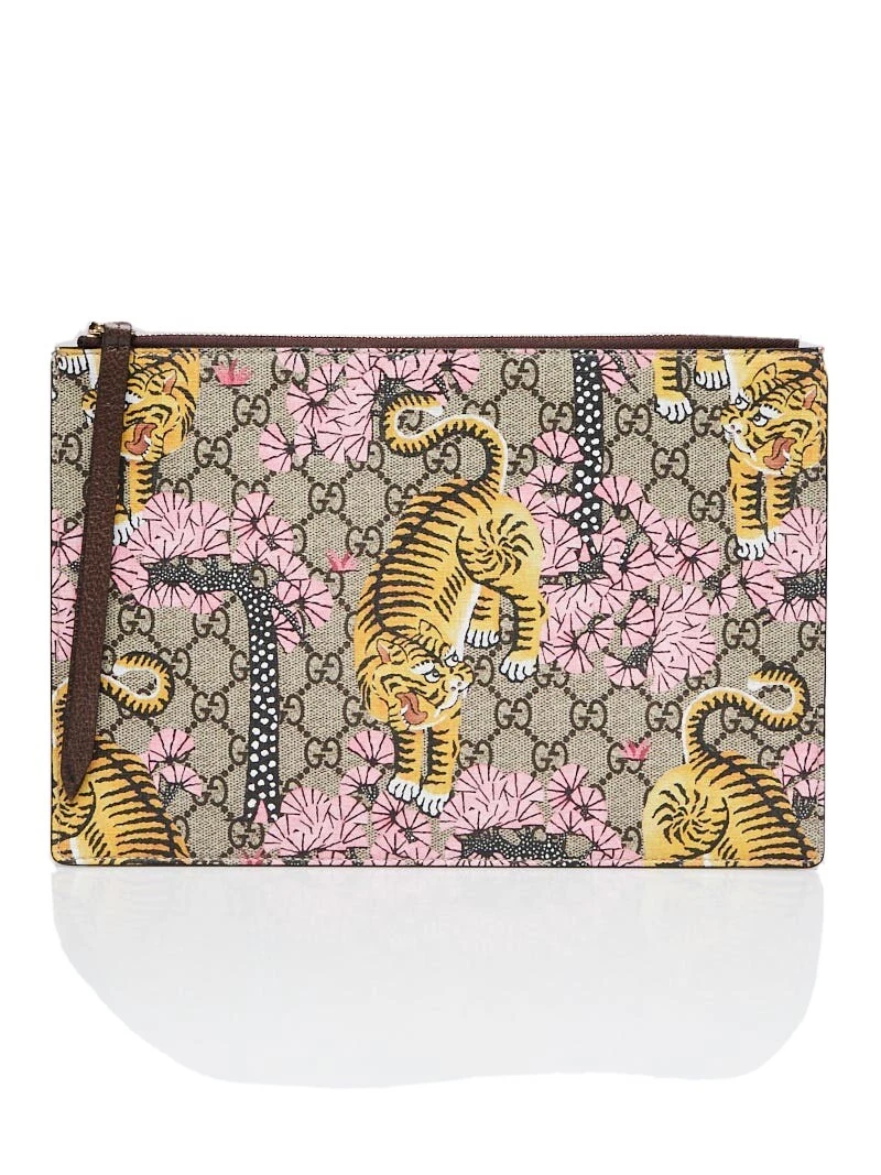 Gucci supreme deals clutch