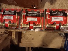 3 brass lever locks, 3 deadbolts KEYED ALIKE