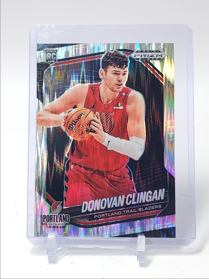 DONOVAN CLINGAN 2024-25 PANINI PRIZM BLACK ROOKIE SKEWED #131 RC /249 Q5759