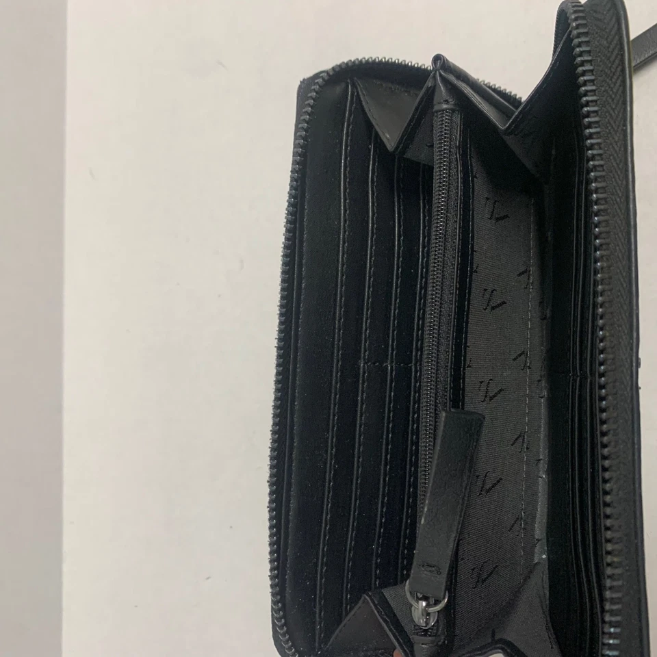 Cartera Vince Camuto para mujer negra perforada corte láser cremallera alrededor Continental Clu Foto 4 de 4