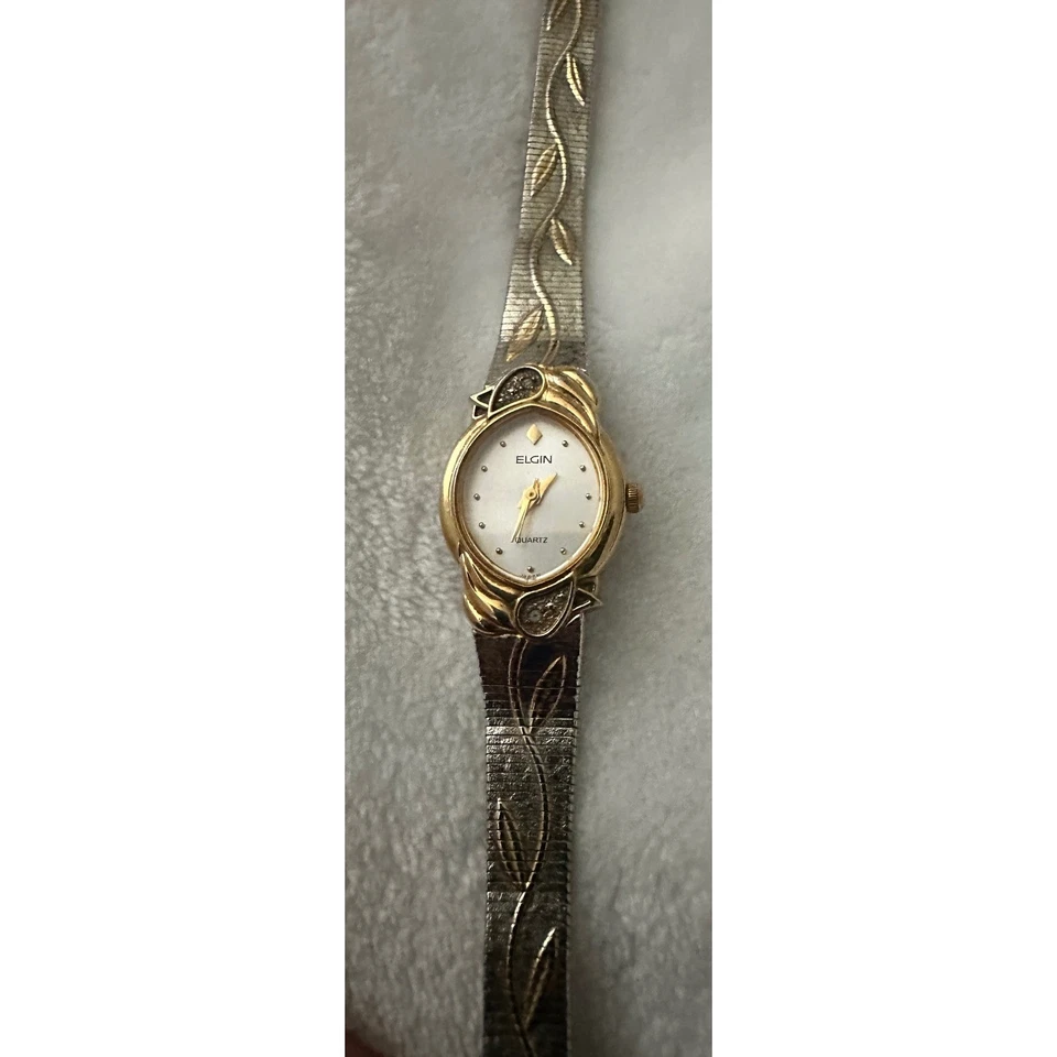 Reloj de cuarzo para mujer Elgin tono dorado con detalles florales EK909-007 S130 SR621SW Foto 2 de 4