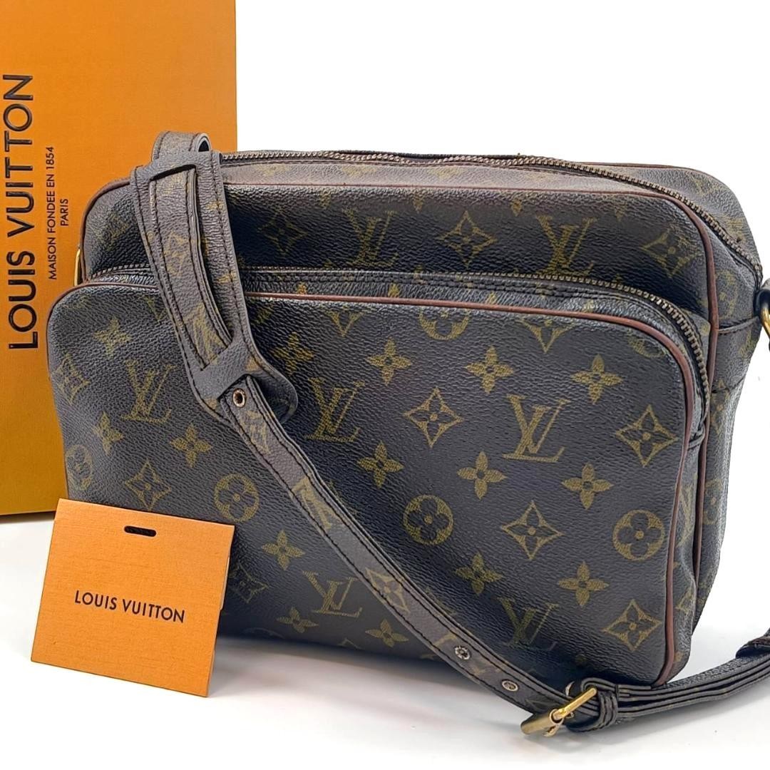 Louis Vuitton Monogram Migratuer Nile Shoulder Bag Pvc Crossbody Bag Designer