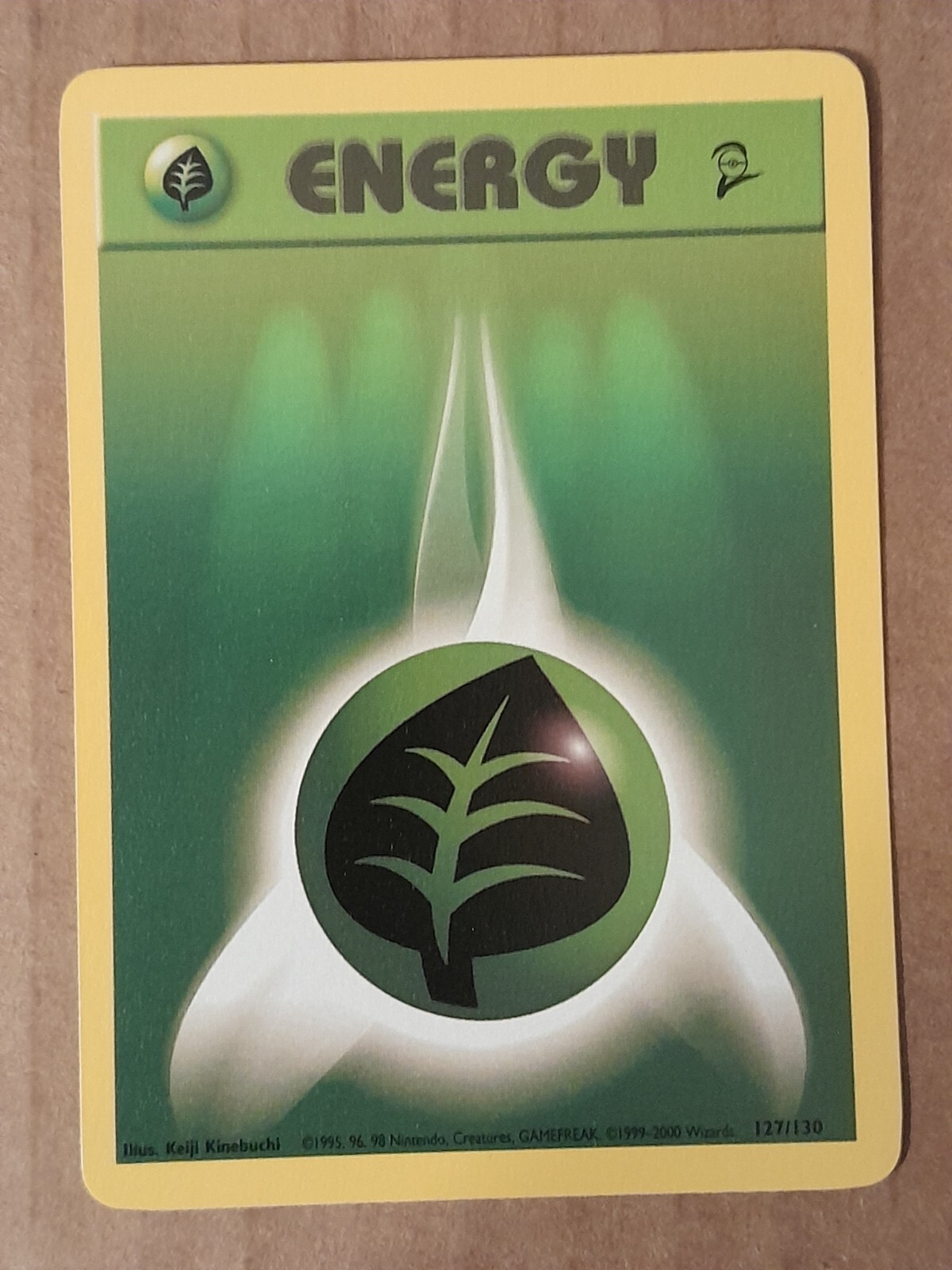 Pokemon Grass Energy 127/130 Base Set 2 NM See Pictures