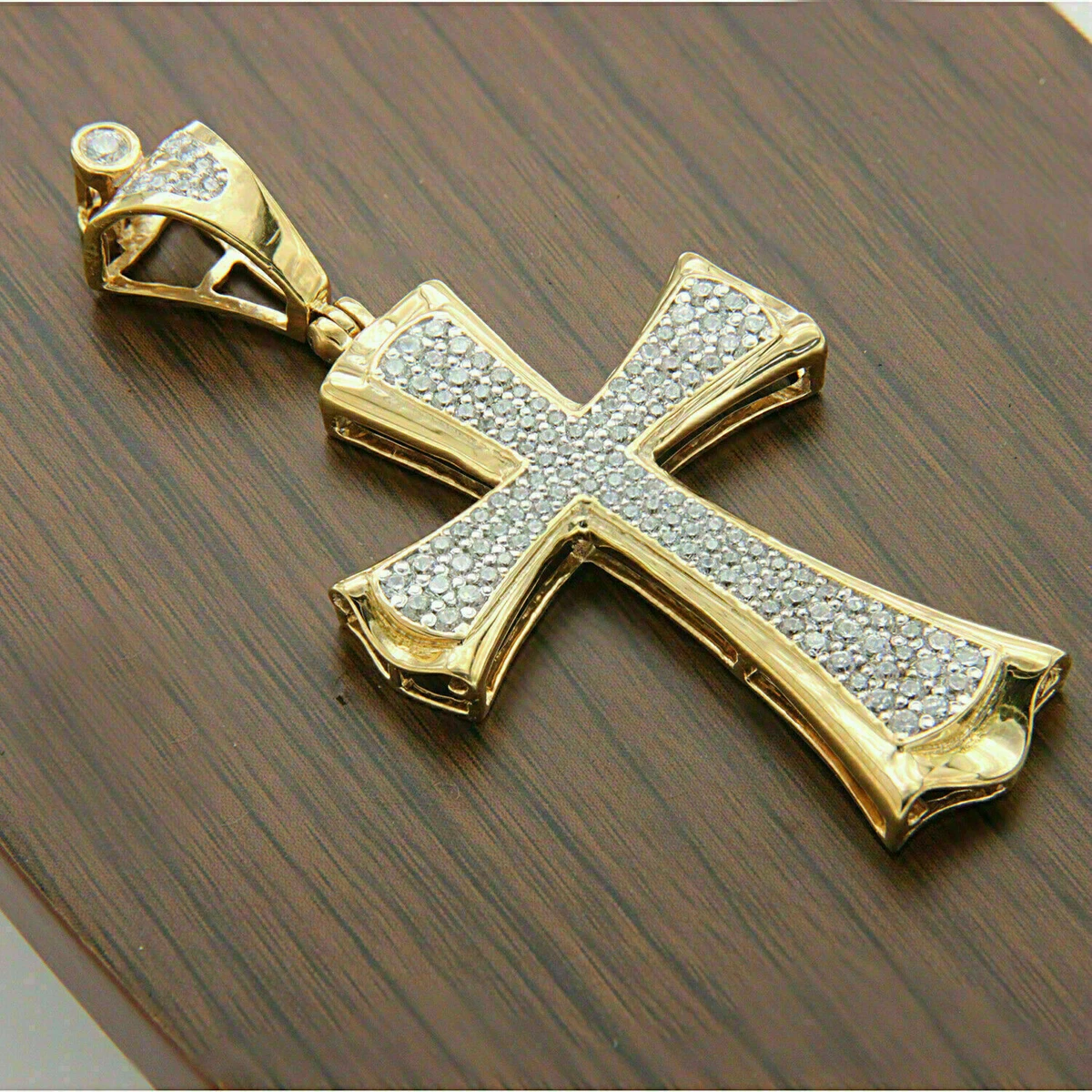 Gold cross necklace with clearance diamond in the middle
