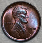 Brilliant Uncirculated 1912-P Lincoln Cent, Beautifully Toned w/ Accents of Red.
