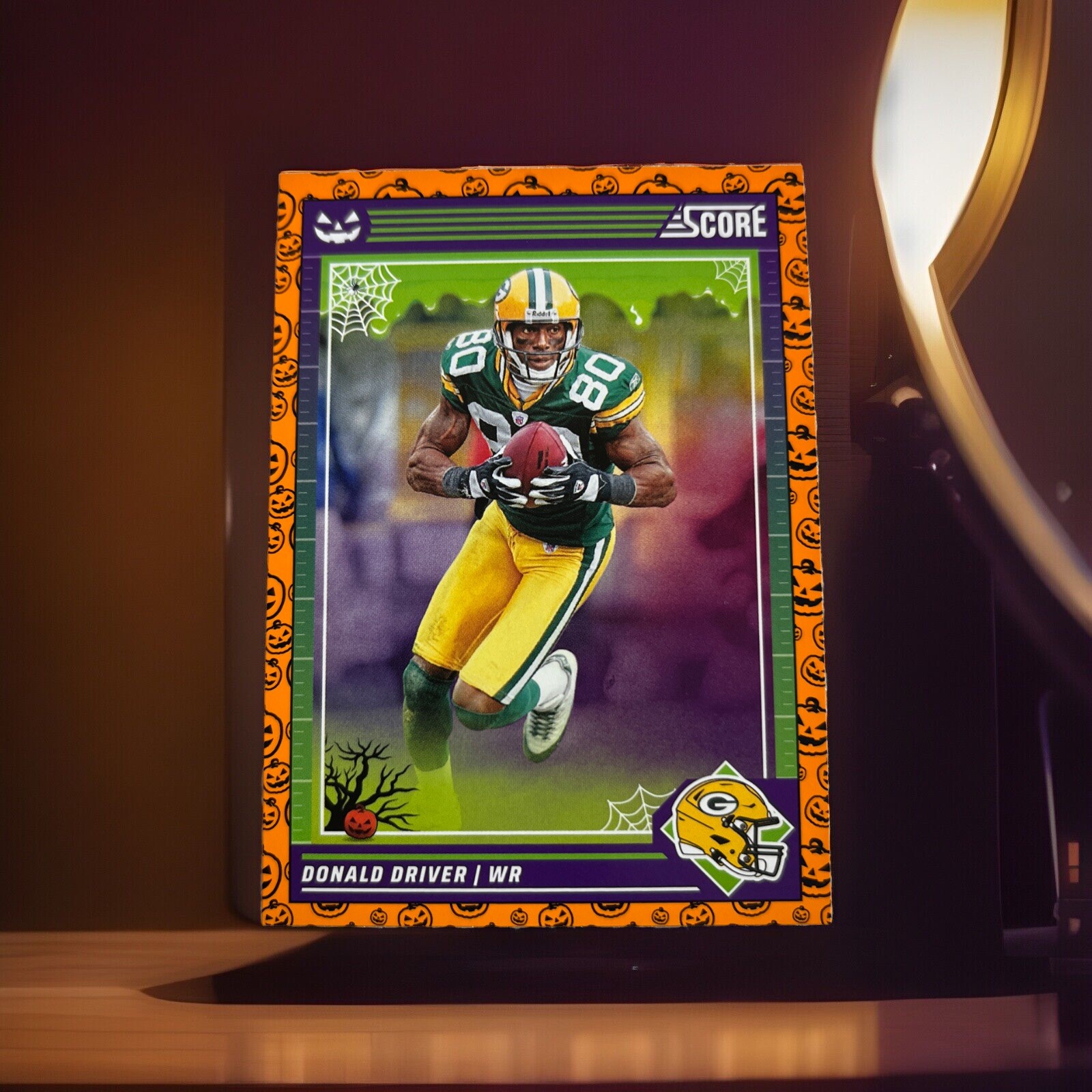 2024 Score Football Halloween Pumpkin Card 108 Donald Driver, Green