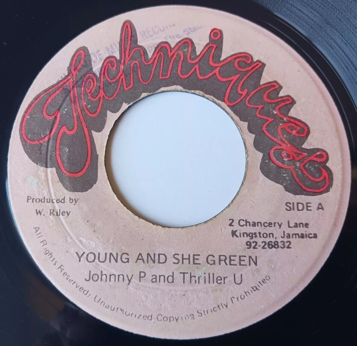Johnny P and Thriller U - Young And She Green Vinyl 45 - Techniques - Jamaica 
