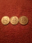 2x1954.1x1962 franklin half dollars.90% silver.good condition.$1.50 face value.