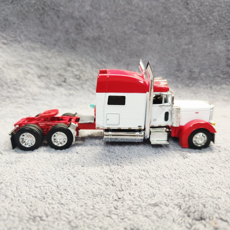 DCP DC WhtRed Peterbilt 379 Mid Roof Sleeper W/ Transcraft Step Deck Trailer. - Image 4 of 4