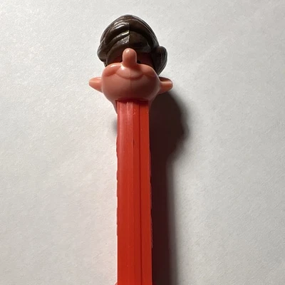 PEZ Cartoon Character Dispenser, Red Stem, Brown Hair, Cartoon Characters Theme - Image 1 of 3