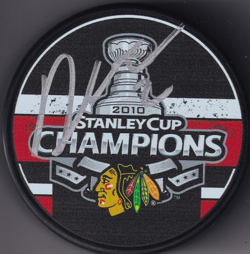BECKETT DUNCAN KEITH SIGNED CHICAGO BLACKHAWKS 2010 STANLEY CUP CHAMPS PUCK 6803