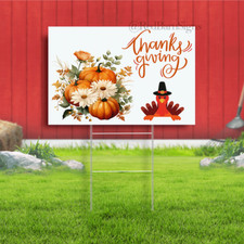 Thanksgiving pumpkins with flowers and turkey yard sign