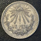 Photo of a 1921 Mexico Un Peso Silver from an eBay listing that sold on Jul 11, 2026