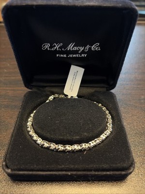1/2 KTTW TENNISARMBAND STERLINGSILBER UND DIAMANT VON MACYS.