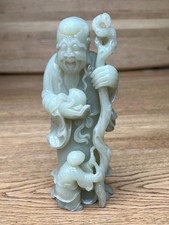 Outstanding Quality Chinese 20th Century Carved Pale Celadon Figure of Shoulao.