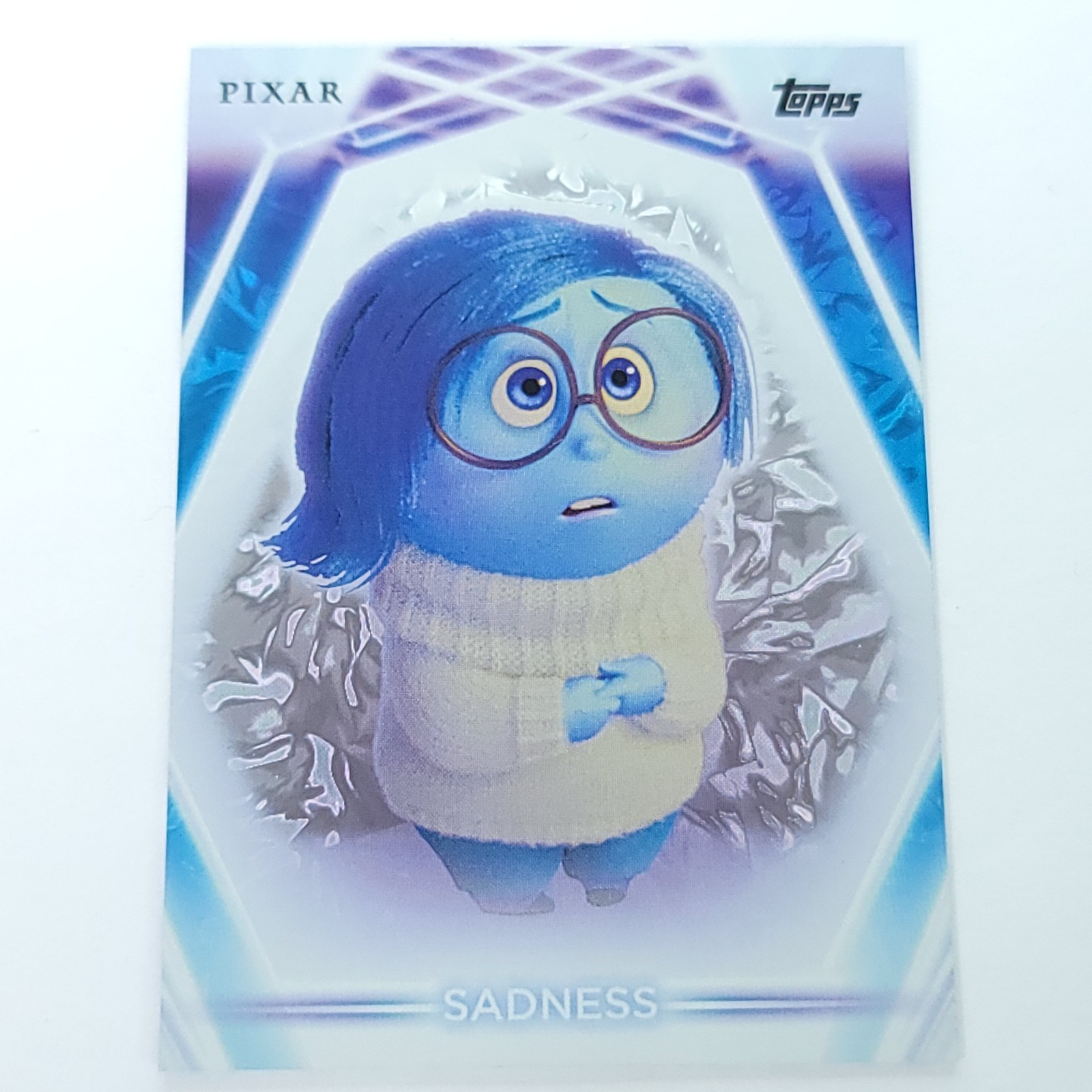 Sadness 2026 Topps Disney Neon Snow Cap Parallel Card #166