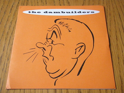 THE DAMBUILDERS - RIECHEN 7'' ORANGE VINYL (EX)