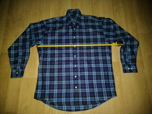Vtg Burberry London plaid button up shirt in navy, red, and blue with yellow measuring tape across the chest.