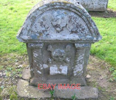 PHOTO  ANCIENT SYMBOLIC STONE IN BEDRULE KIRKYARD IN THE HAMLET OF BEDRULE IN TH