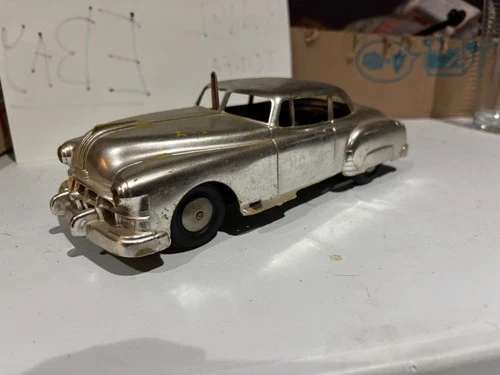 1950s Marx De-Luxe mechanical electric lighted car Pontiac vintage toy