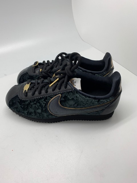 nike black and gold cortez